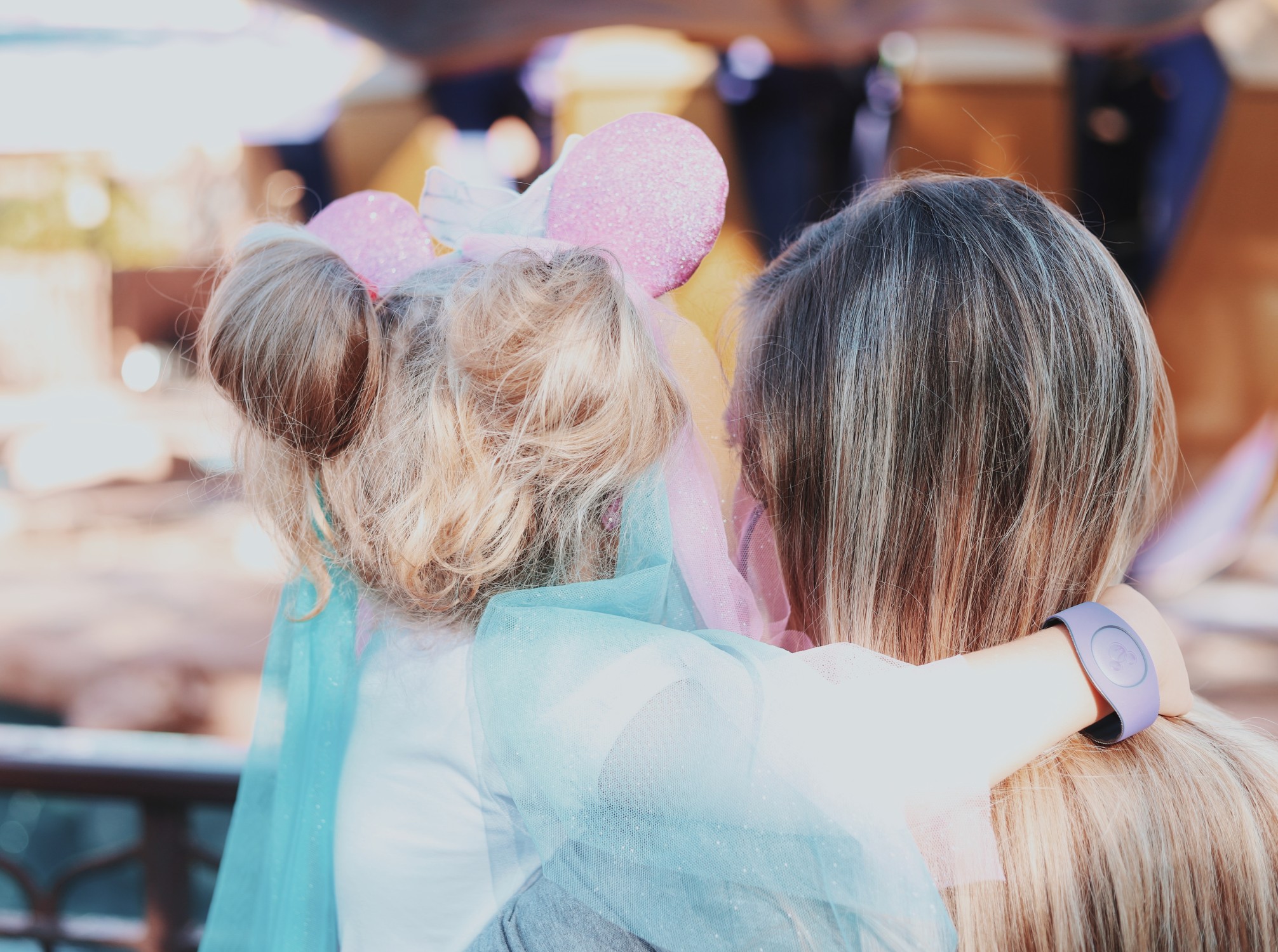 A child and adult enjoying a moment of playful connection